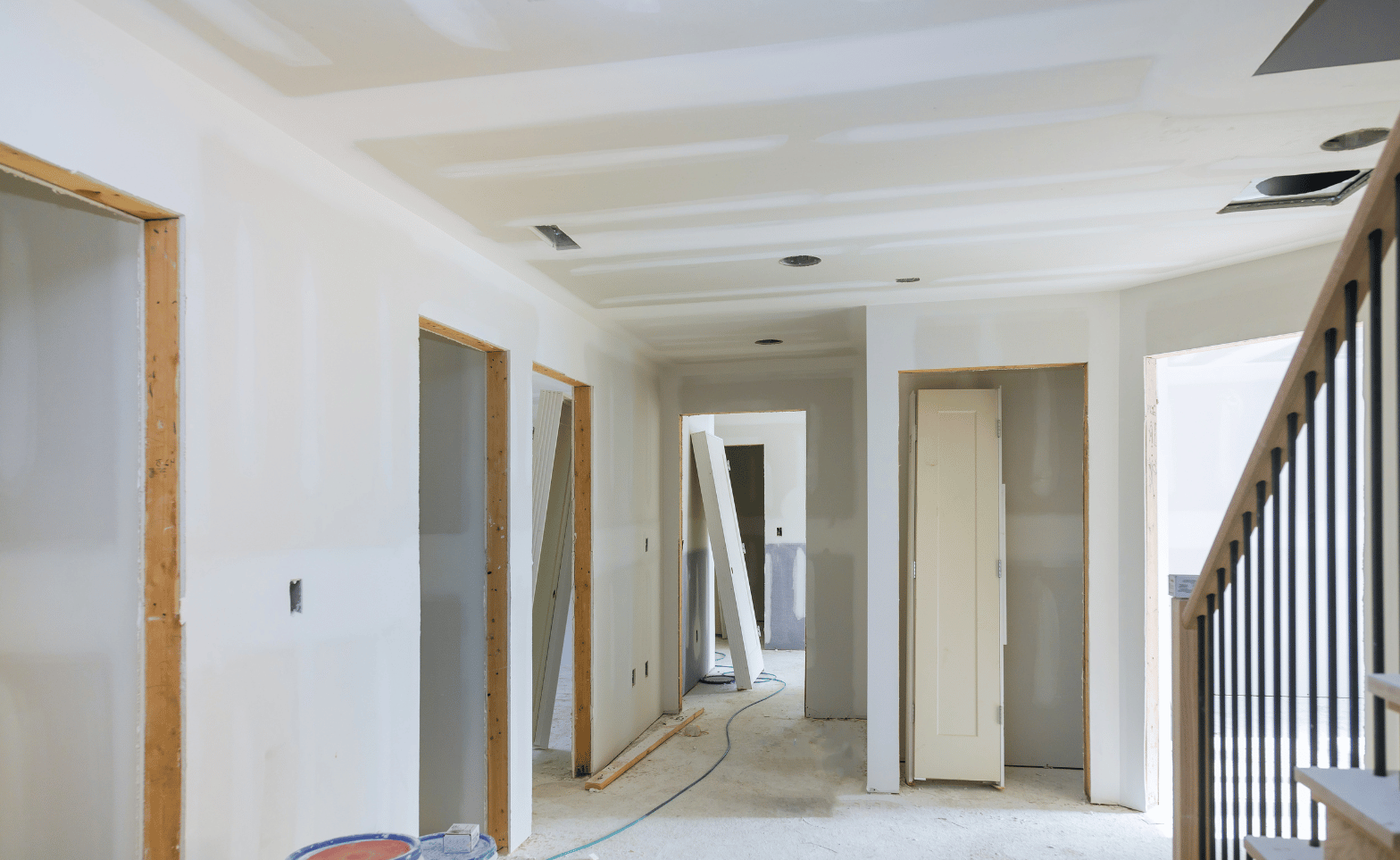 room with drywall work and tools